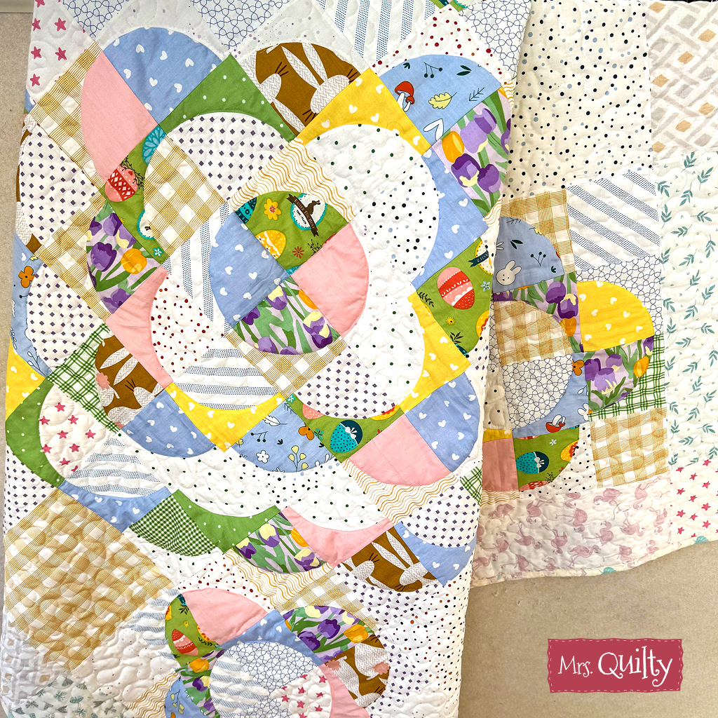 Add a vibrant touch to your decor with the Floral Quilt Downloadable PDF Quilt Pattern—featuring circular and geometric designs in pastel and bright colors, ideal for creating statement table pieces or showing off your unique quilting skills.
