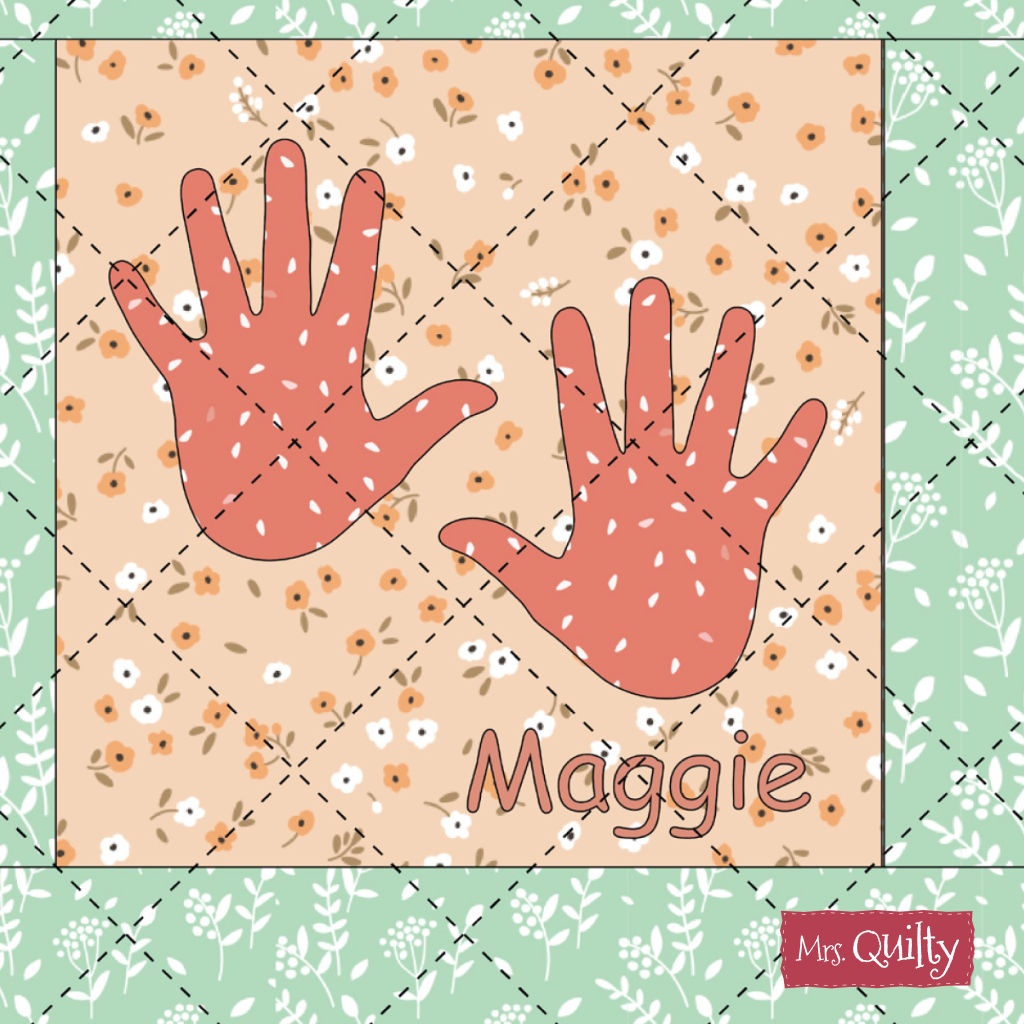 Two handprints on a floral-patterned square and “Maggie” with “Mrs. Quilty” in the corner—capture cherished memories from a special quilting project with the Hand in Hand Table Runner Downloadable PDF.