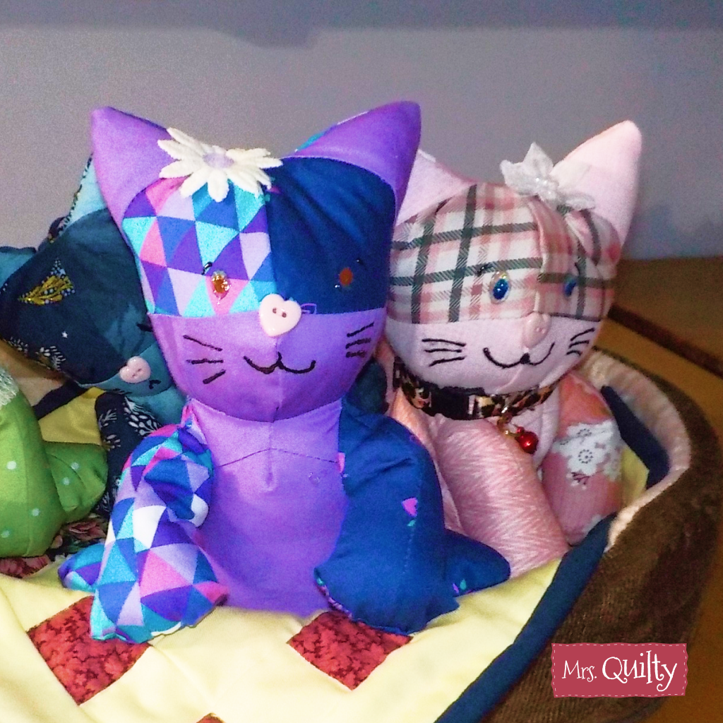 Katie the Kitten downloadable PDF quilt pattern lets you create an adorable fabric cat with a button nose and stitched smile, perfect for showing off your quilting skills.