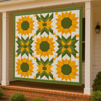 A vibrant quilt made from the Sunflower Dance Downloadable PDF Quilt Pattern in yellow and green hangs on display outside a white house with brick steps and columns.